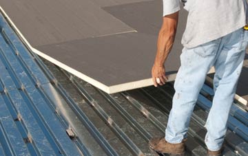 benefits of insulating Mans Cross flat roofing